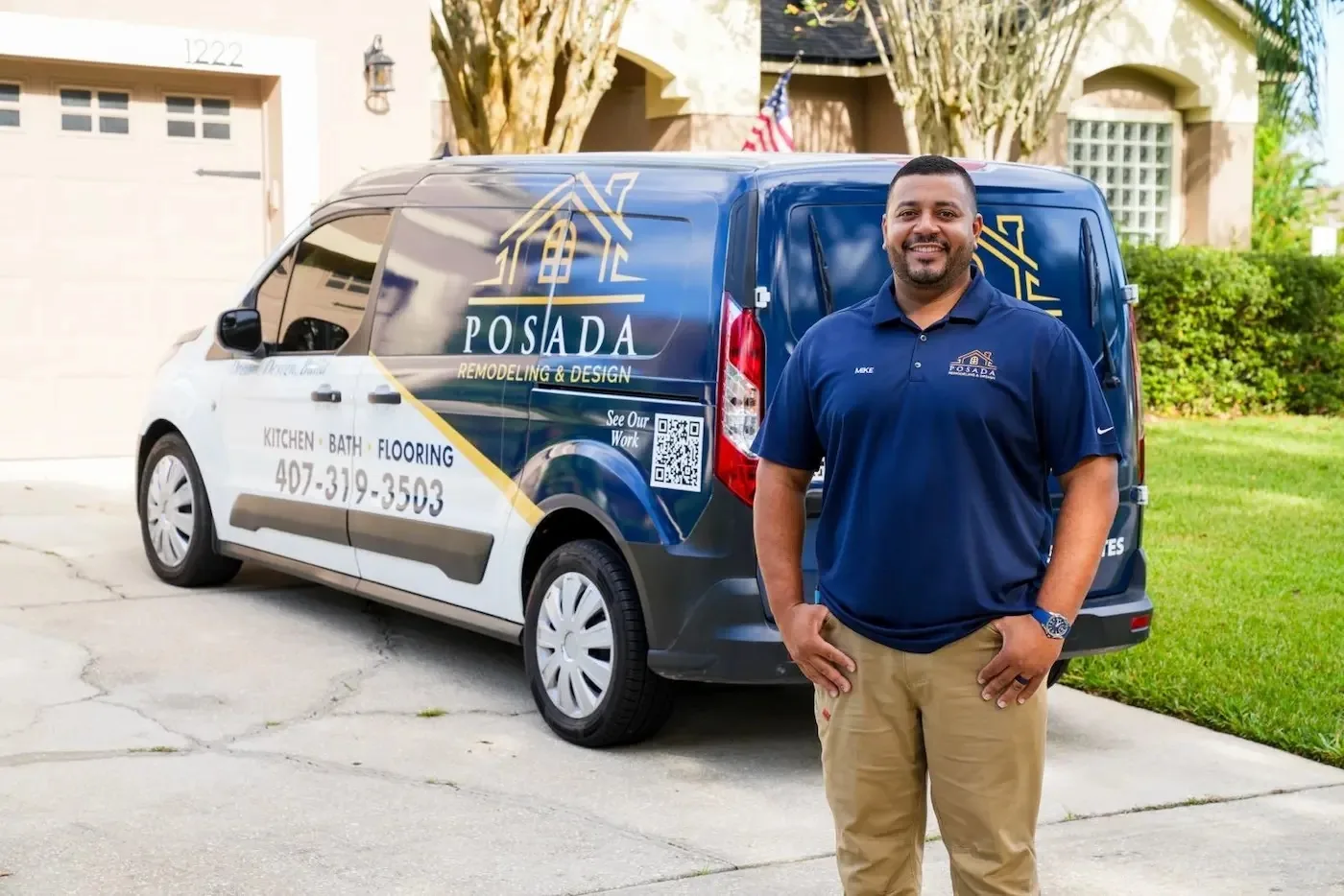 Mike Posada, owner and founder of Posada Remodeling and Design, beside the company van in Casselberry, FL