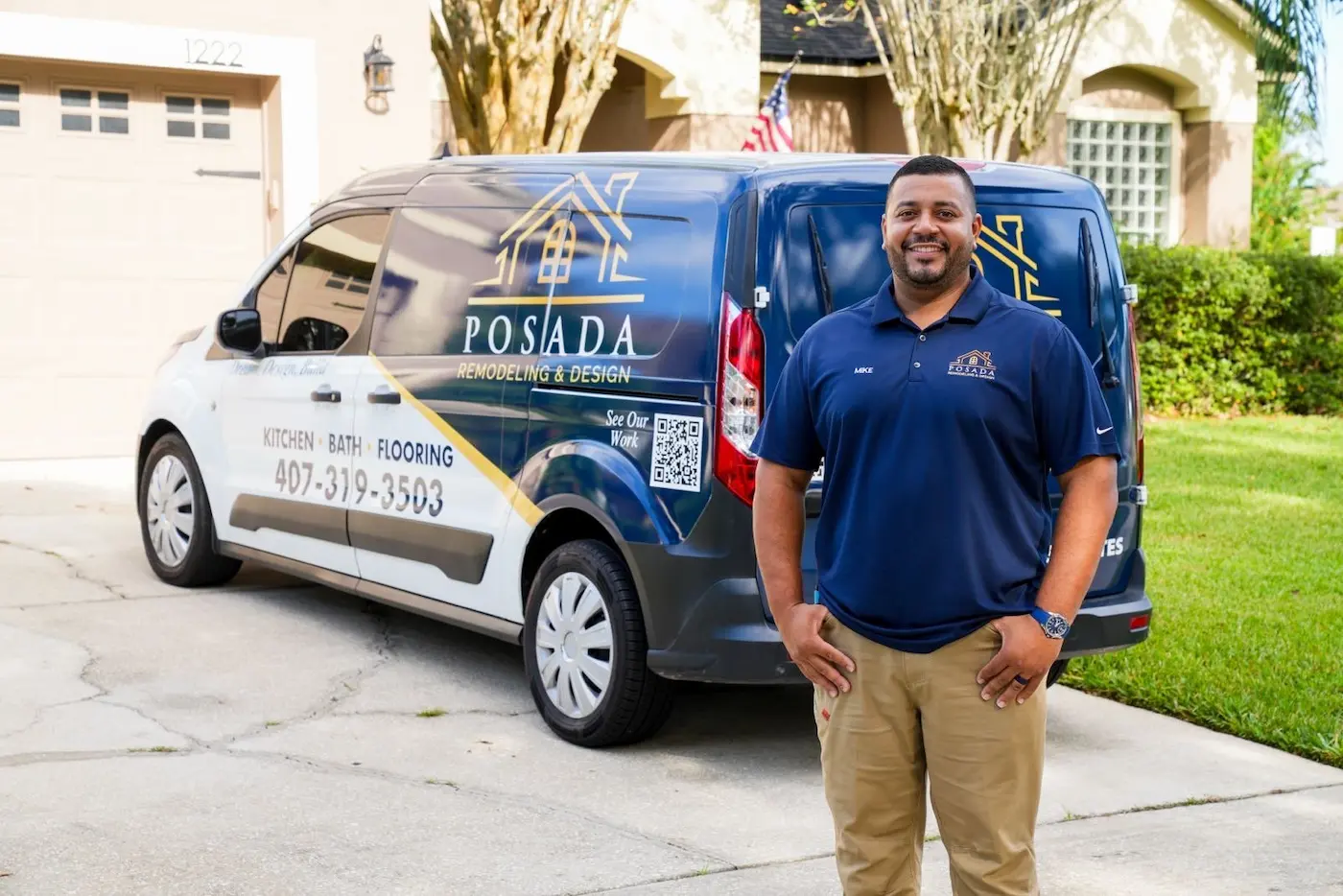 Mike Posada, owner of Posada Remodeling & Design, standing in front of company vehicle in Orlando