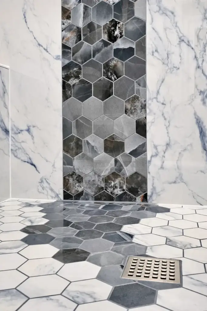 Hexagon tile detail in luxury bathroom shower design