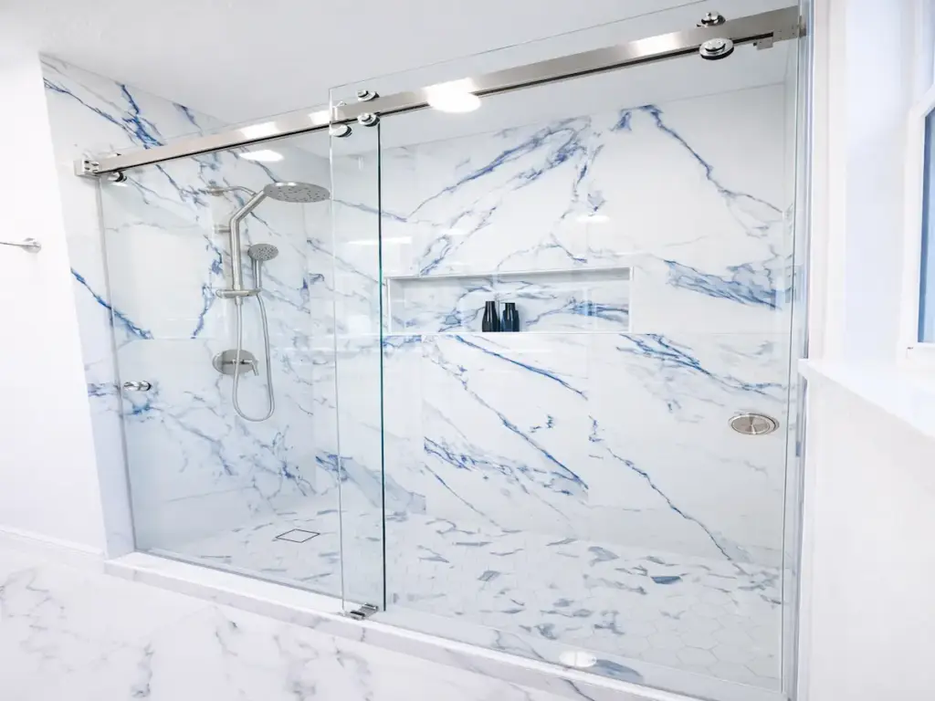 custom tile shower remodel with frameless glass enclosure in lake mary florida